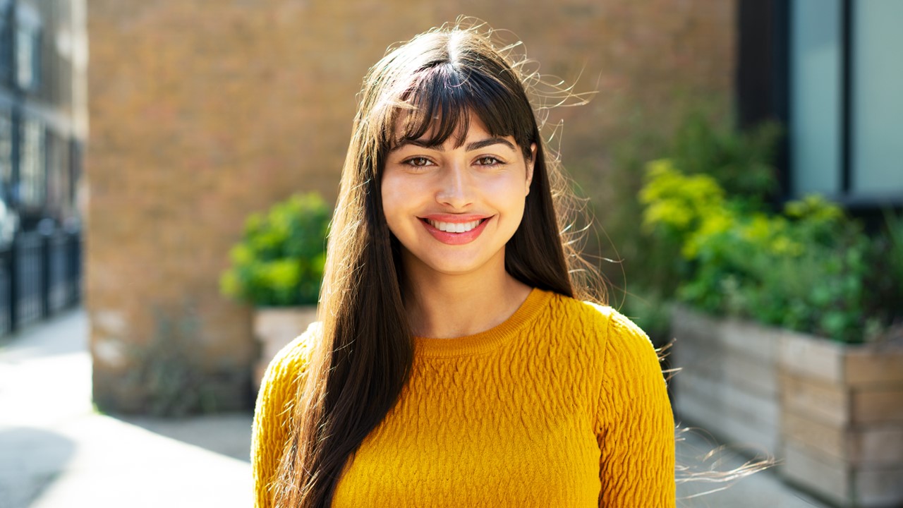 WHP successes Andrea Pioneer photo only Woman smiling wearing yellow jumper