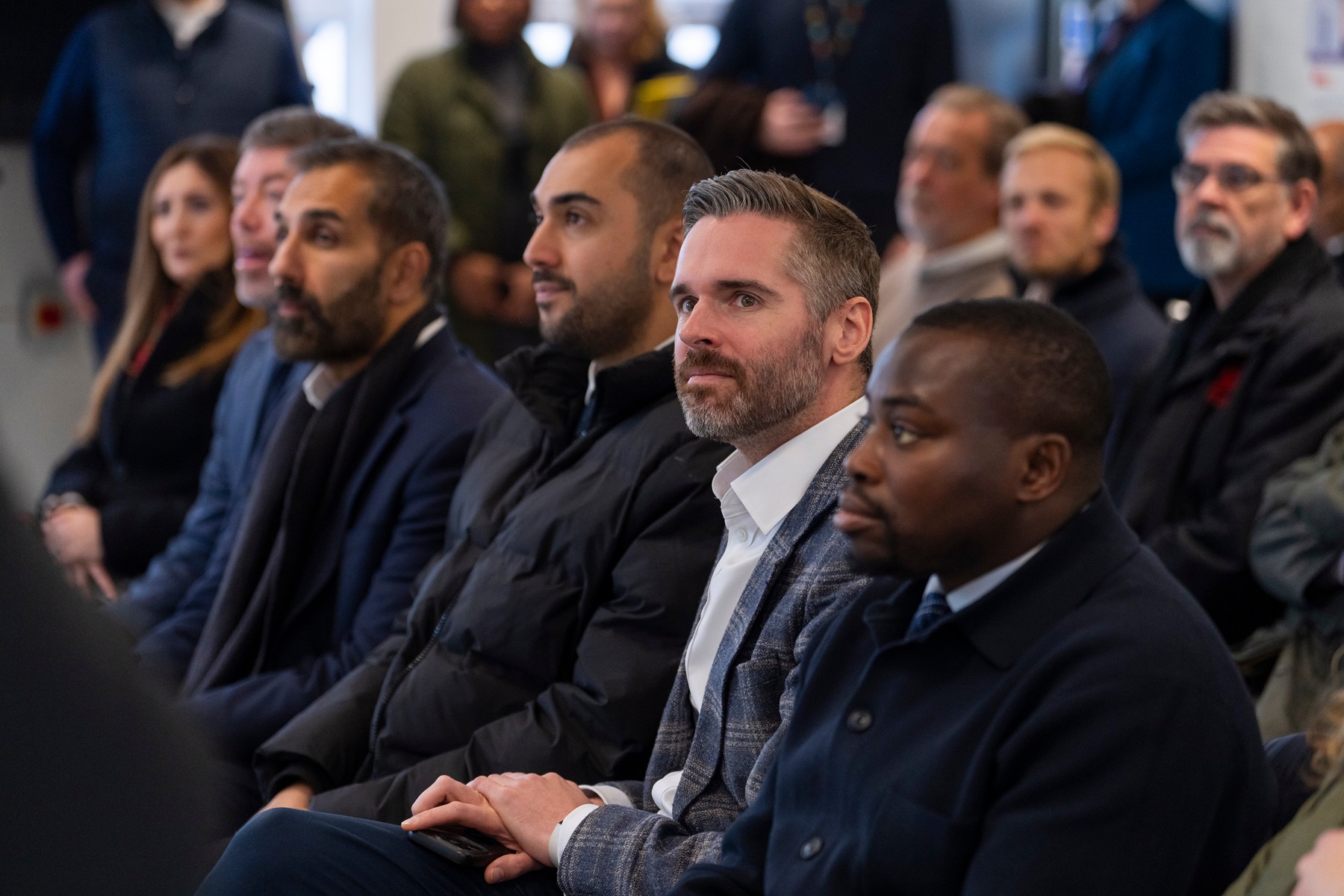Leaders and Deputy Mayor listening to presentation