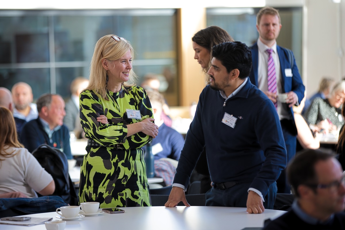 Delegates speaking at the Summit