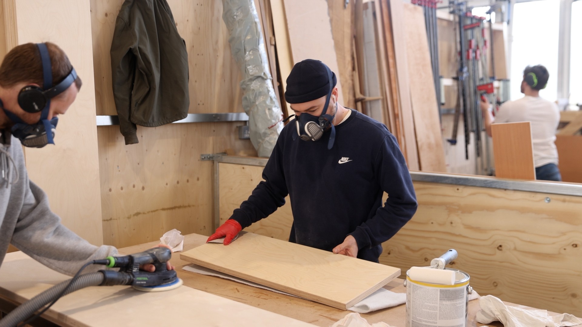 Two learners doing wood work at Enfield BLOQS, London's largest open-access workshop,