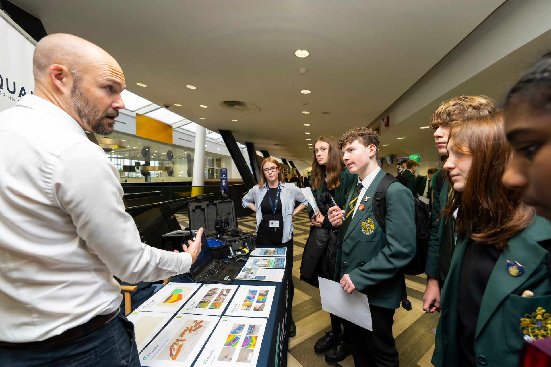 East-London-Climate-KickStart-Event-Greenwich-student-from-The-John-Roan-School-find-out-about-thermal-imaging Decorative: Equans speaking to students at careers fair
