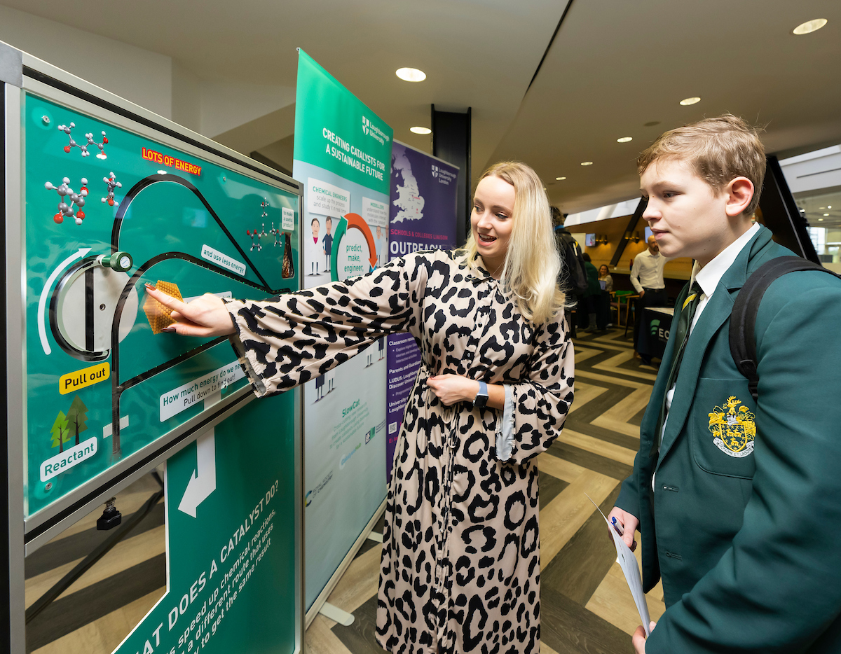 Student at careers fair speaking to an employer